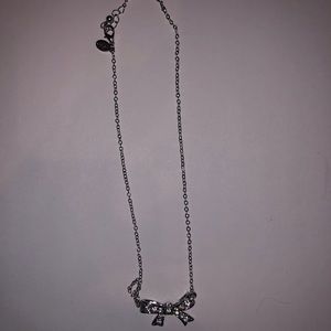Jewelry: Silver Bow Necklace